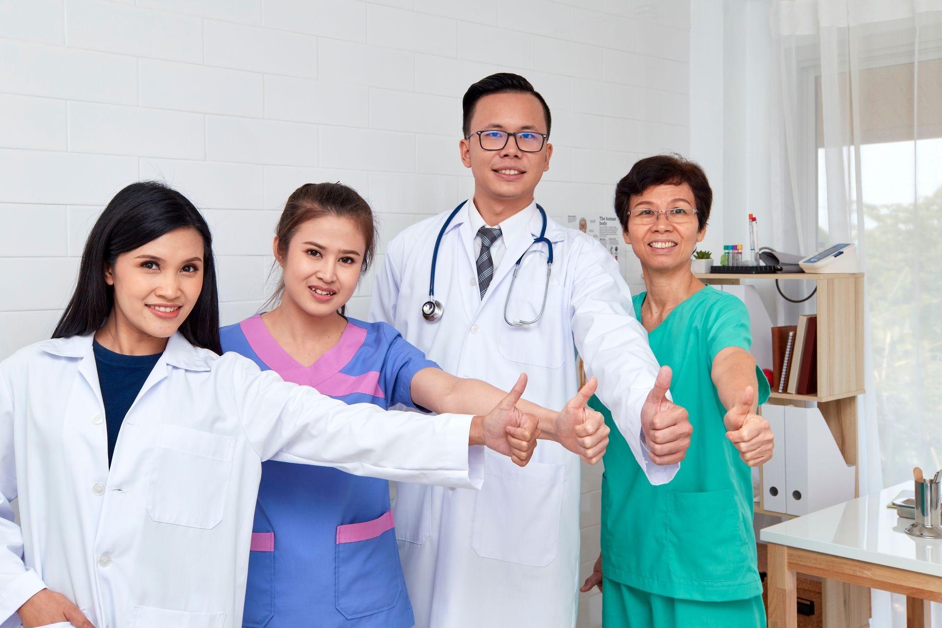 Asian Healthcare people group. Professional doctor working in hospital office or clinic with other doctors, nurse and surgeon. Medical technology research institute and doctor staff service concept.